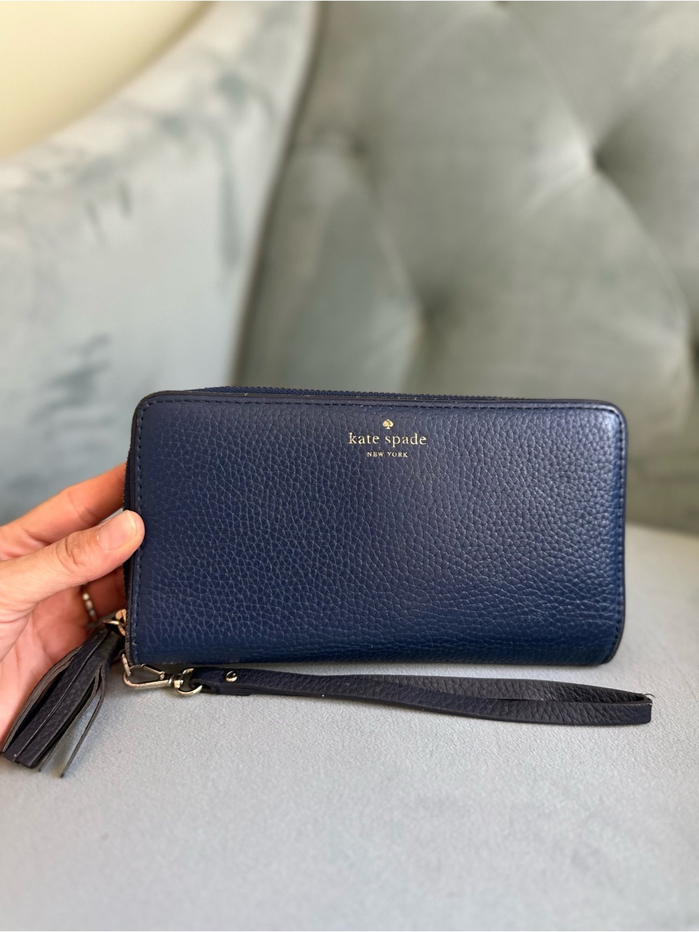 kate spade navy pebbled leather zip wristlet with tassel